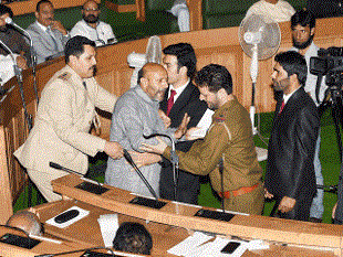 Rasheed marsahlled out of Lower House